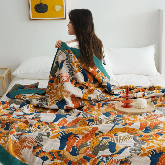 Housse de couette gaze coton motif oiseaux et fleurs sur lit