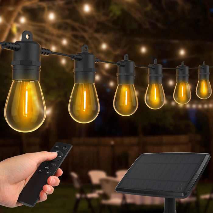 Guirlande lumineuse solaire LED incassable illuminant un jardin le soir