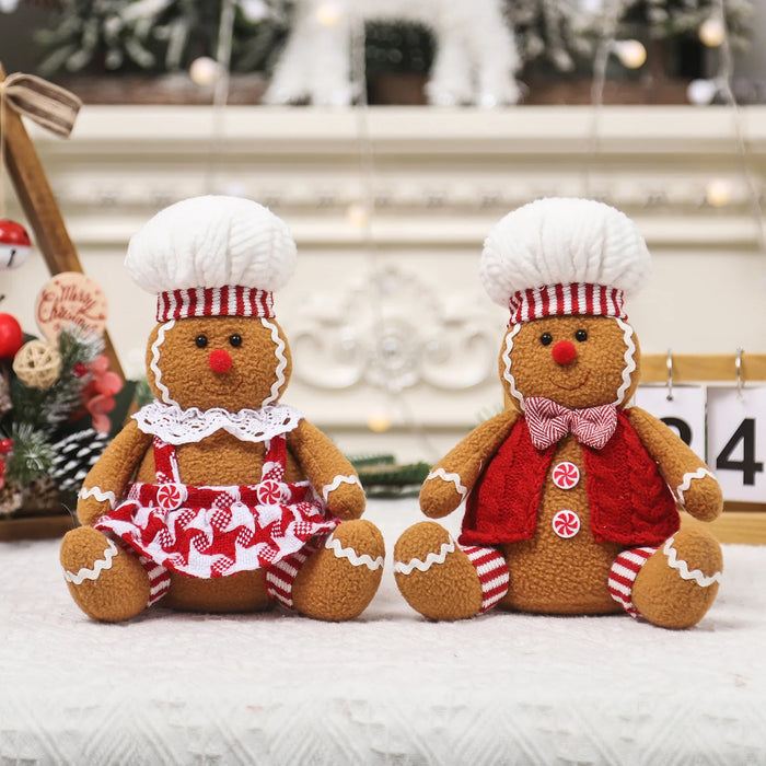 Grand couple bonhomme pain d'épice assis décoration Noël