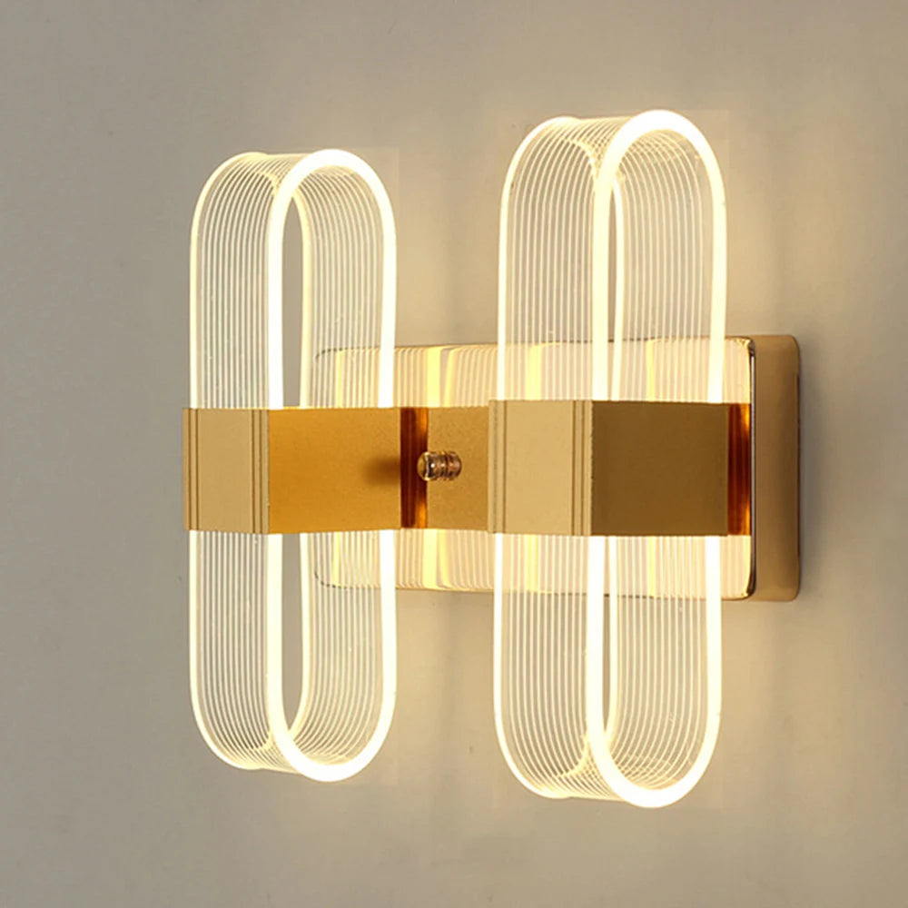 Applique murale LED elliptique design moderne en métal et acrylique