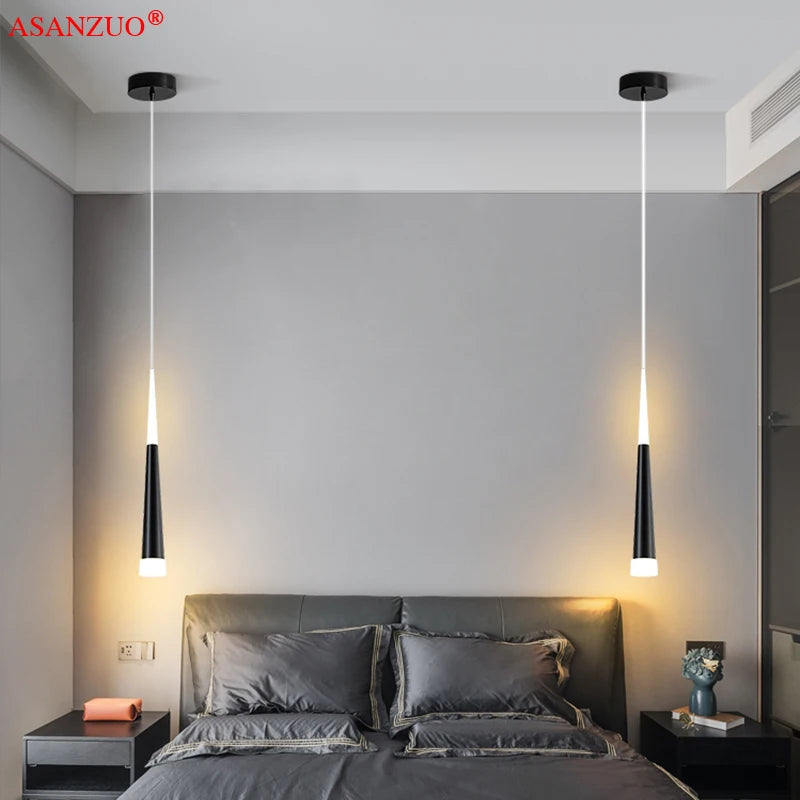 Lampe de chevet suspendue moderne à fil long en rouge sur fond neutre
