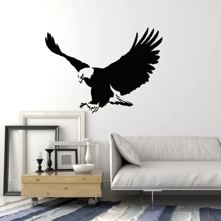 Sticker mural aigle tribal noir sur mur blanc dans une chambre moderne