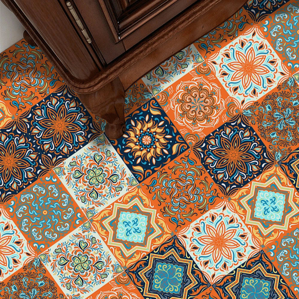 Autocollant de carrelage floral orange posé sur un mur de cuisine
