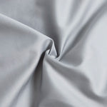 Variantes de couleur des draps : gris, bleu et blanc