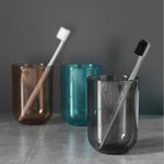 Gobelet de toilette transparent en plastique bleu
