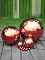 Sphère décorative extérieure rouge poli pour jardin moderne