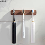 Porte brosse à dents prune dans salle de bain élégante