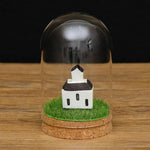 Terrarium en verre avec galets décoratifs à l'intérieur