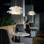 Lampe fleur acrylique allumée ambiance chaleureuse