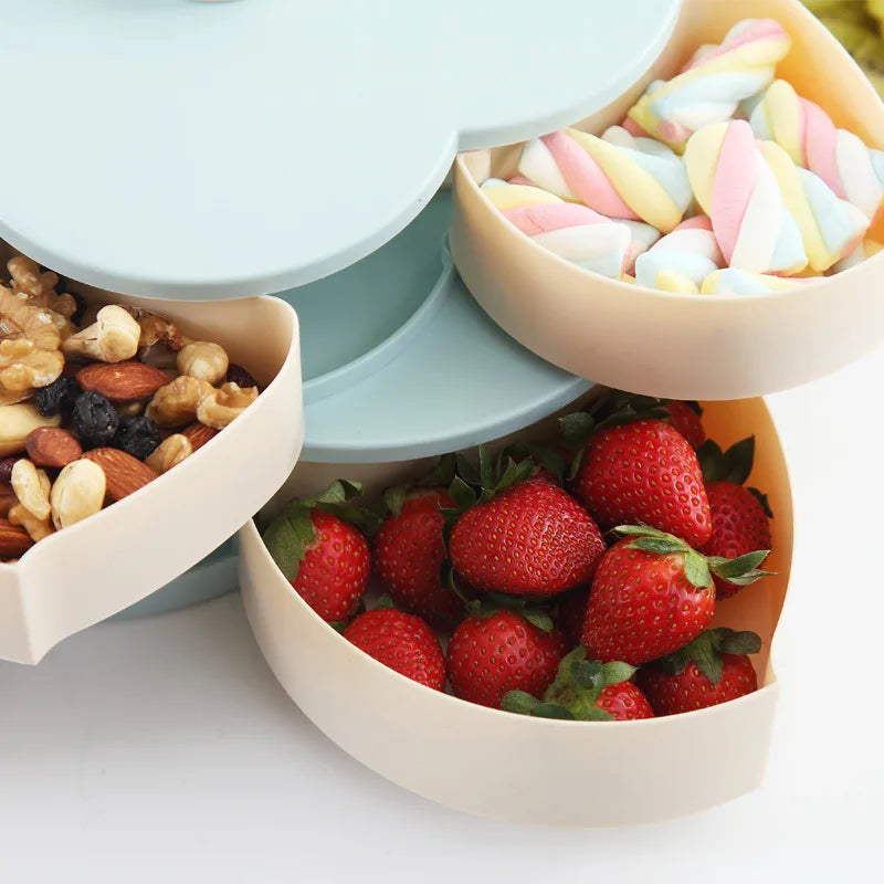 Boîte de rangement rotative verte avec bonbons et fruits secs