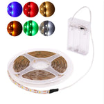 Détail du ruban LED SMD2835 avec adhésif et connexion pour piles
