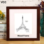 Cadre photo carré en bois blanc avec plexiglas écologique sur fond mural neutre