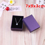 Présentoir de boîtes à bijoux violettes