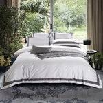 Ensemble literie blanc avec housse de couette et taies d'oreiller