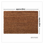 Détail de la texture antidérapante du paillasson en coco