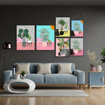 Le mur décoré de tableaux colorés avec des plantes et des motifs géométriques crée un décor moderne et vivant dans ce salon.