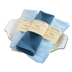 Ces serviettes en coton 100% de la marque Yanting sont disponibles en couleurs bleu clair et bleu foncé, avec des étiquettes jaunes.