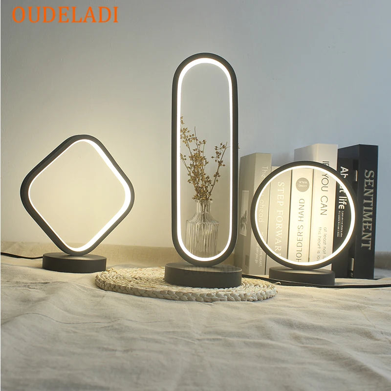 Lampe de bureau noire LED éclairant un espace de travail