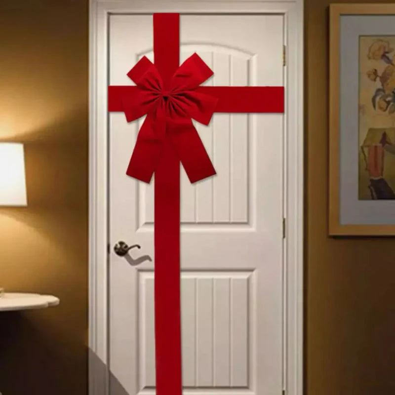Décoration de porte Noël nœud papillon suspendu imitation lin rouge vu de face