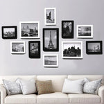 Ensemble de 11 cadres photo architecture moderne sur mur blanc