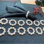 Lot de 12 ronds de serviette argent sur table décorée