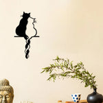 Détail de la décoration murale chat métal noir montrant la finition et le design