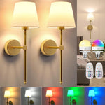 Applique murale sans fil rechargeable en couleur or sur un mur blanc