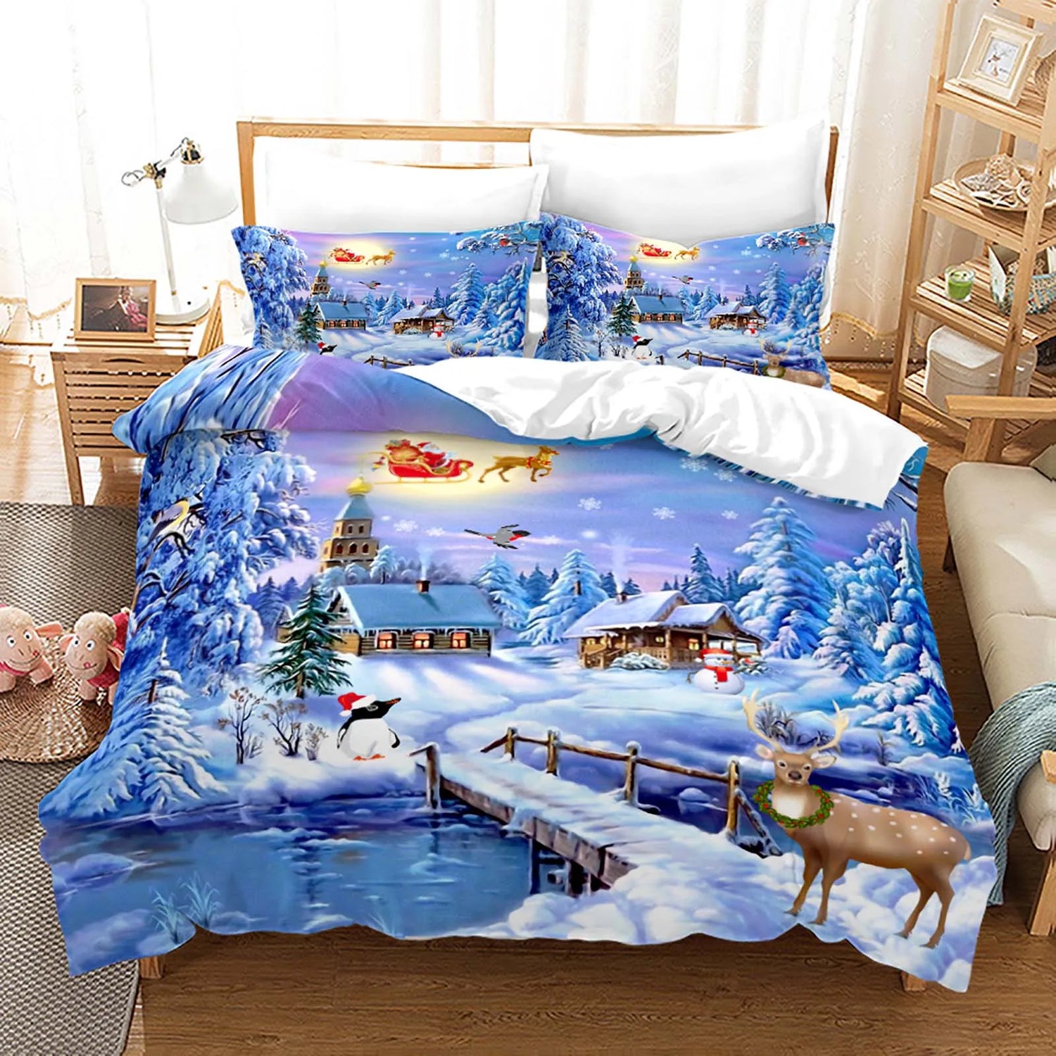 Parure de lit Noël rouge avec motif Père Noël et bonhomme de neige sur un lit