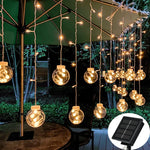 Guirlande lumineuse solaire extérieure de 5 mètres avec boules LED éclairées la nuit