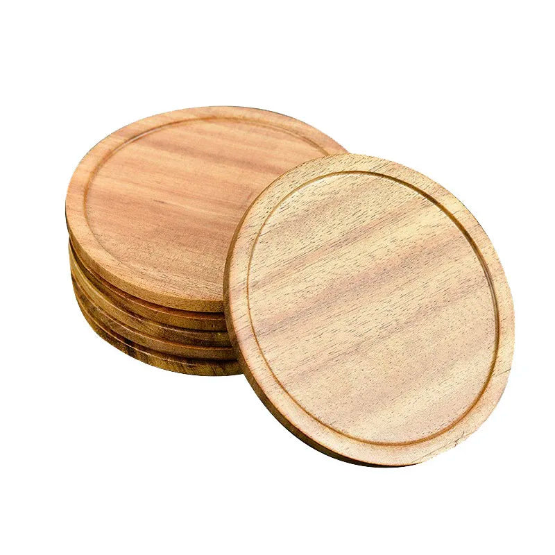 Dessous de verre bois naturel posé sur table blanche