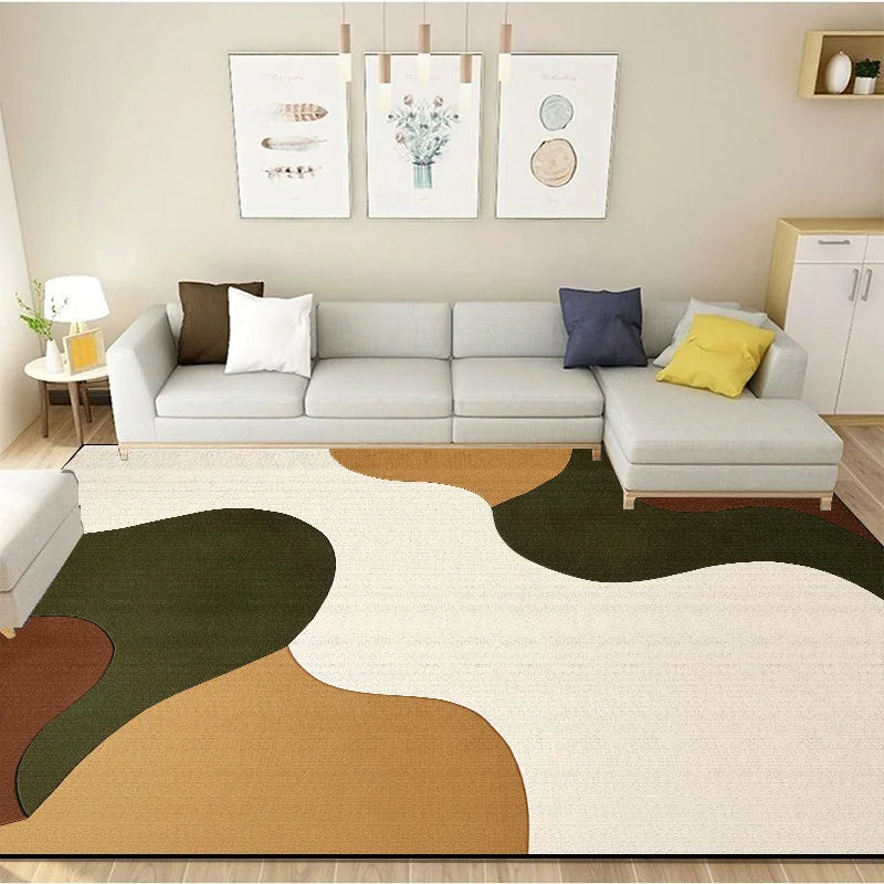 Un salon moderne et lumineux avec un canapé gris confortable, des coussins décoratifs et des œuvres d'art murales harmonieuses, le tout posé sur un tapis aux motifs organiques apportant une touche élégante à l'ensemble.