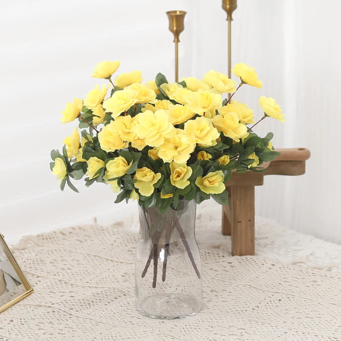 Bouquet de fleurs artificielles en soie Azalée rose sur table