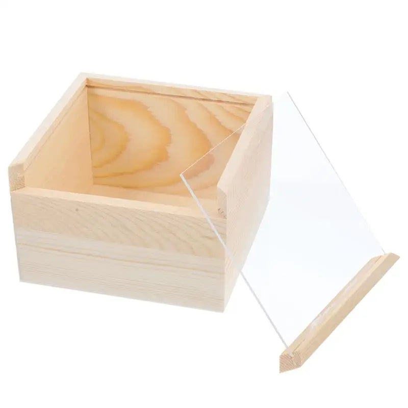 Boîte à bijoux placée sur une coiffeuse avec accessoires