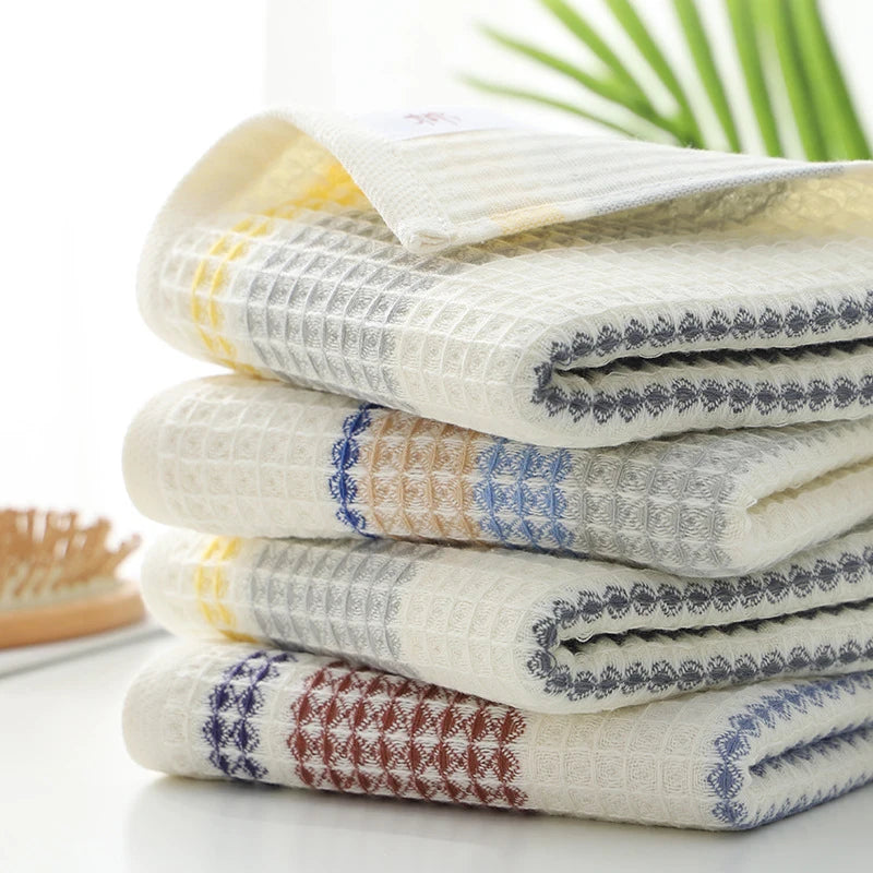 Serviette de bain pliée montrant son épaisseur