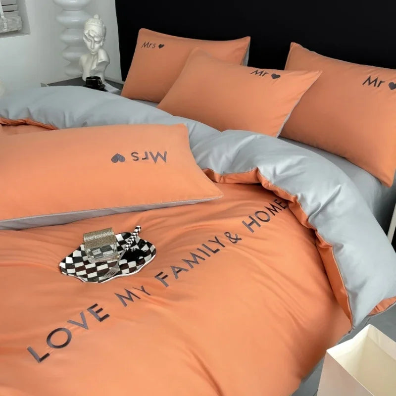 Parure de lit grise dans une chambre décorée style scandinave