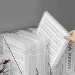 Boîte de rangement A4 ouverte avec documents à l'intérieur