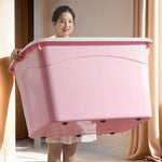 Boîte de rangement rose empilable pour optimiser l'espace