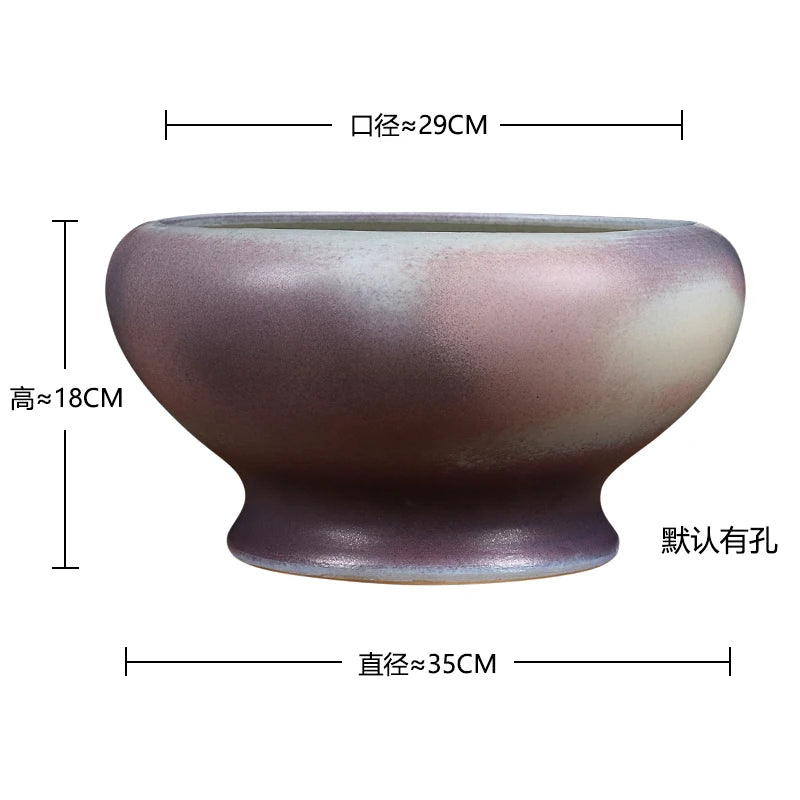 Un bol en céramique de style minimaliste et de couleur grise-rose, avec des dimensions d'environ 35 cm de diamètre et 18 cm de hauteur.