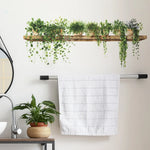 Application du sticker mural feuille verte dans une chambre décorée
