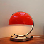 Lampe de bureau orange en verre et fer