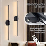 Applique murale LED sans fil noire dans une chambre à coucher moderne