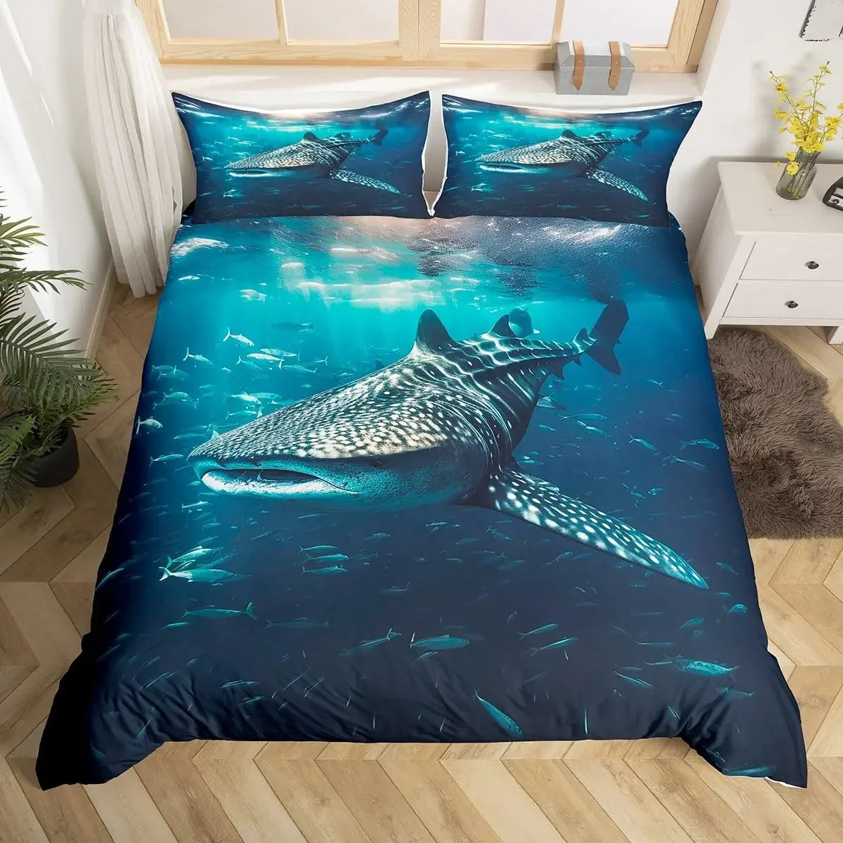 Housse de couette imprimée poissons requins bleue marine sur lit