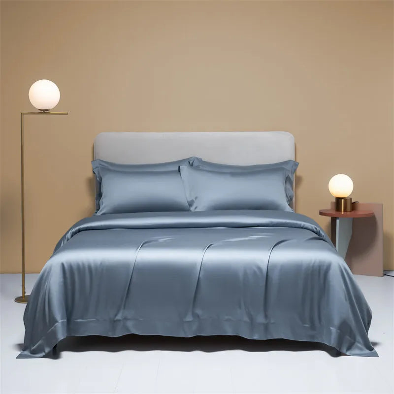 Housse de couette 200x200 en soie naturelle couleur blanche sur un lit