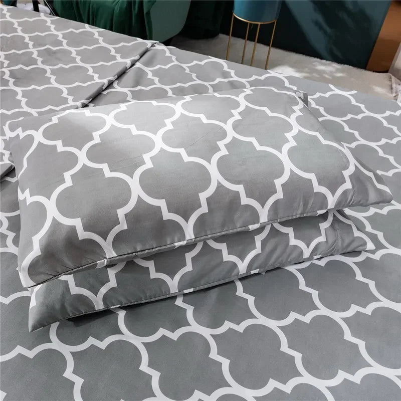 Drap housse et taie d'oreiller blanc