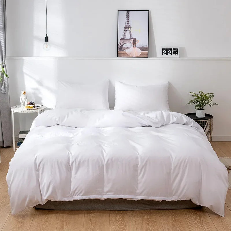 Ensemble housse de couette et taies d'oreiller unis