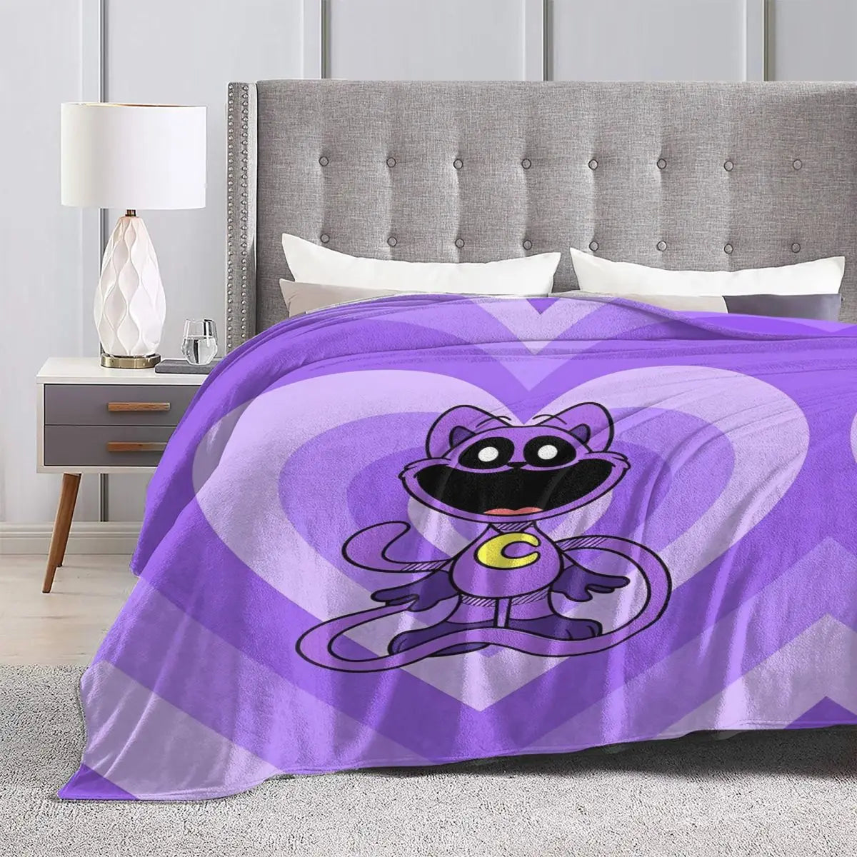 Couverture jaune cœur de chat pliée