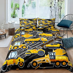 Détail du motif véhicules de construction sur housse de couette jaune