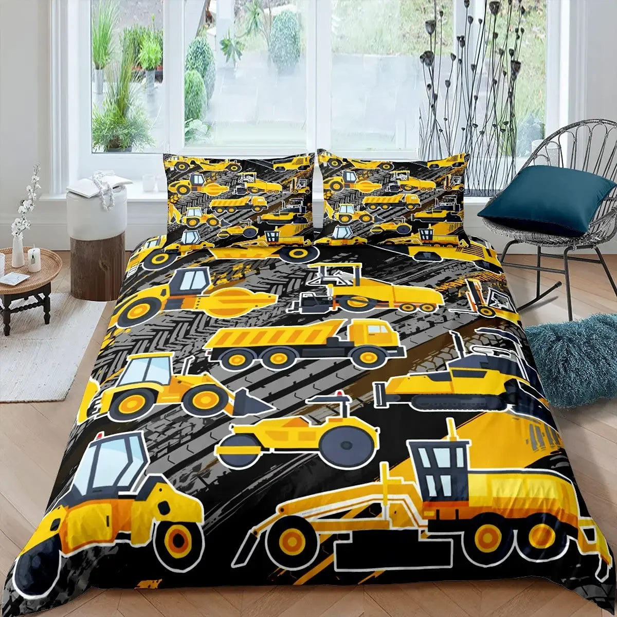 Détail du motif véhicules de construction sur housse de couette jaune