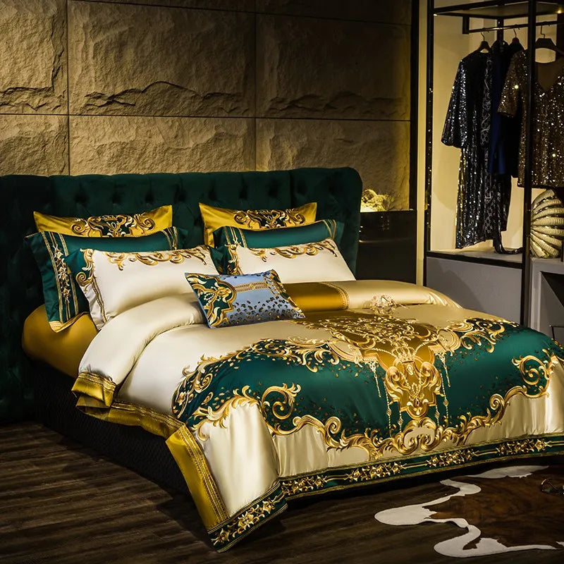 Housse de couette brodée or et vert sur lit