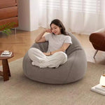 Pouf de sol en rotin orange